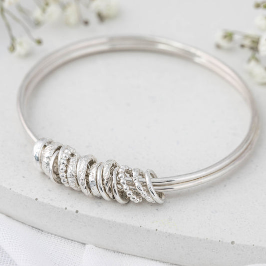 Silver charm bangle