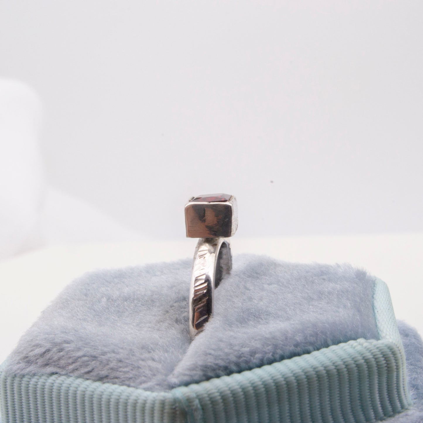 Garnet faceted square ring with textured band Size L