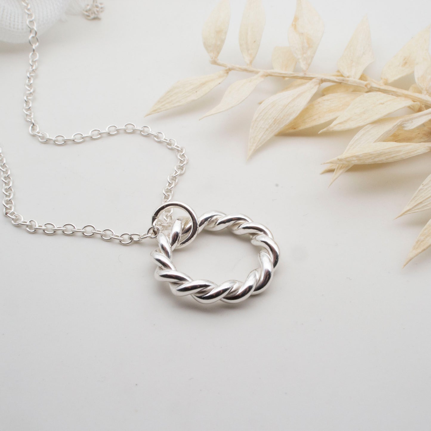 Entwined Silver Circle Pendant – A Symbol of Connection