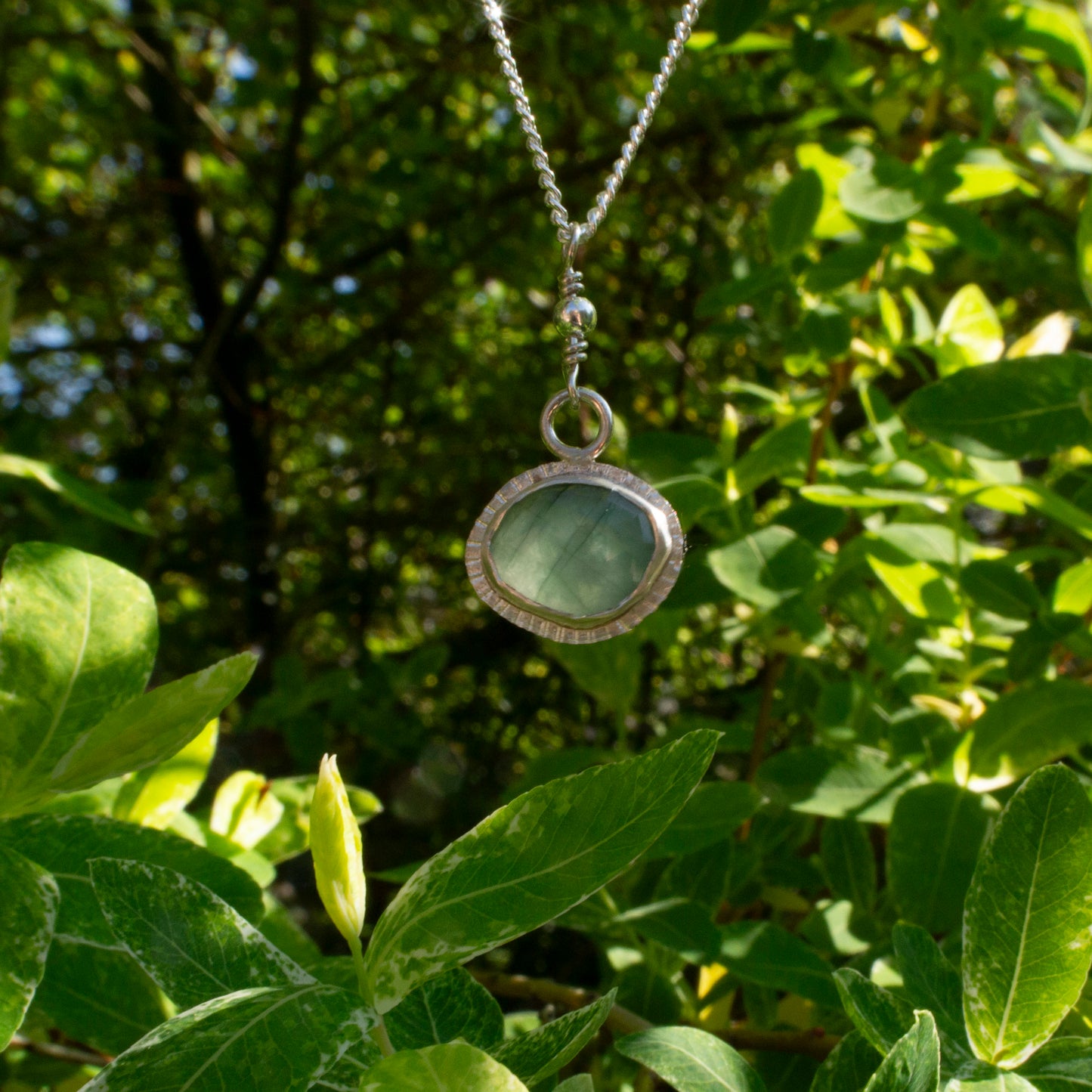 Framed emerald pendant necklace