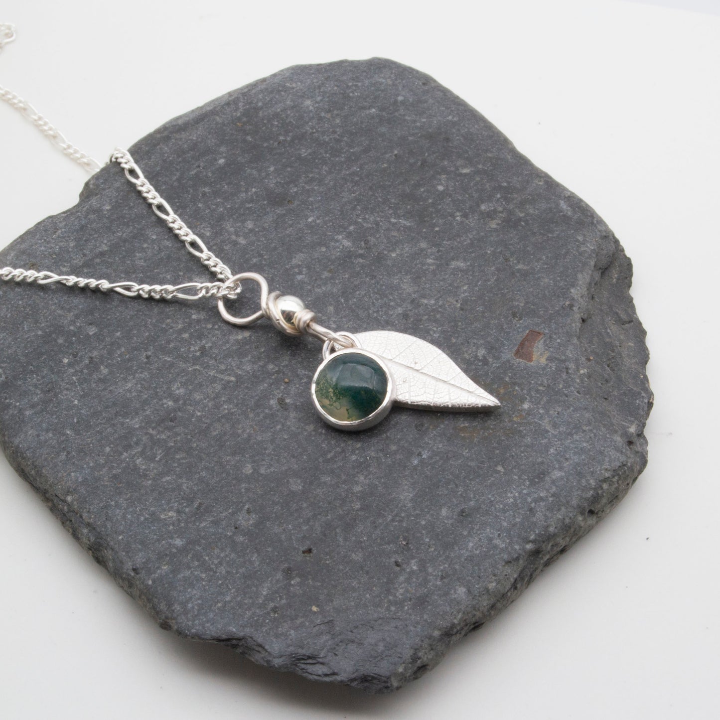 Moss agate pendant with silver leaf