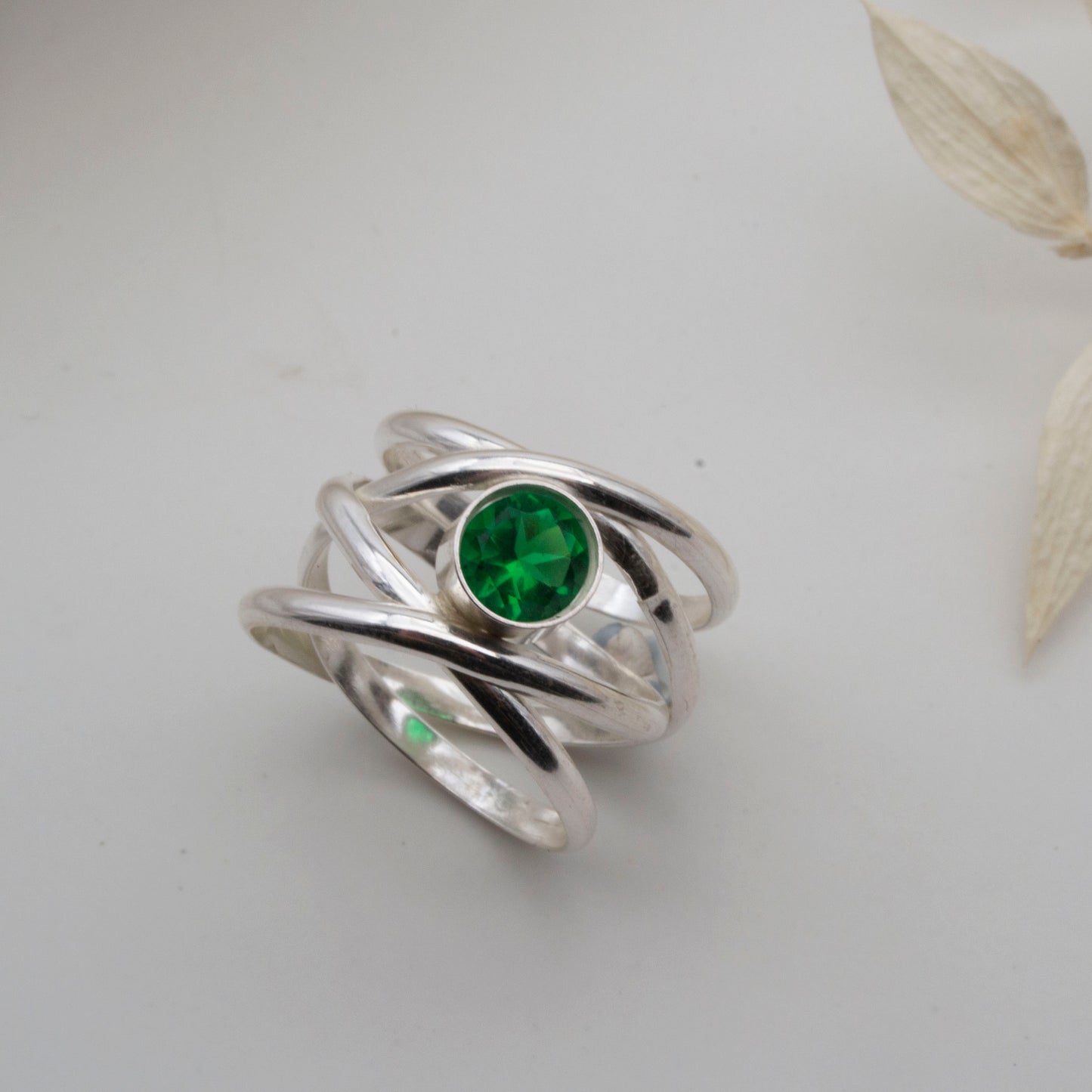 Spiralling gemstone ring