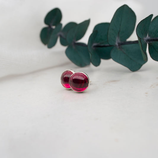 Ruby stud earrings in sterling silver