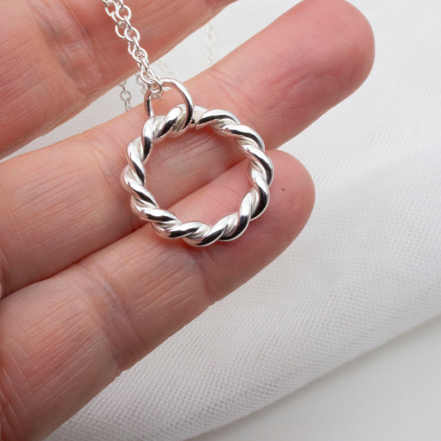 Entwined Silver Circle Pendant – A Symbol of Connection