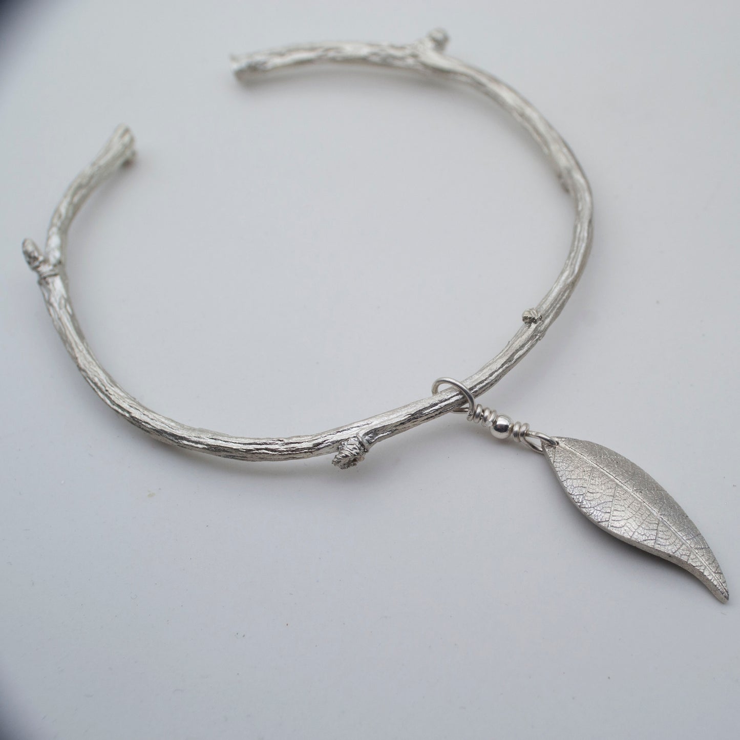 Apple twig sterling silver cuff bangle with sterling silver leaf