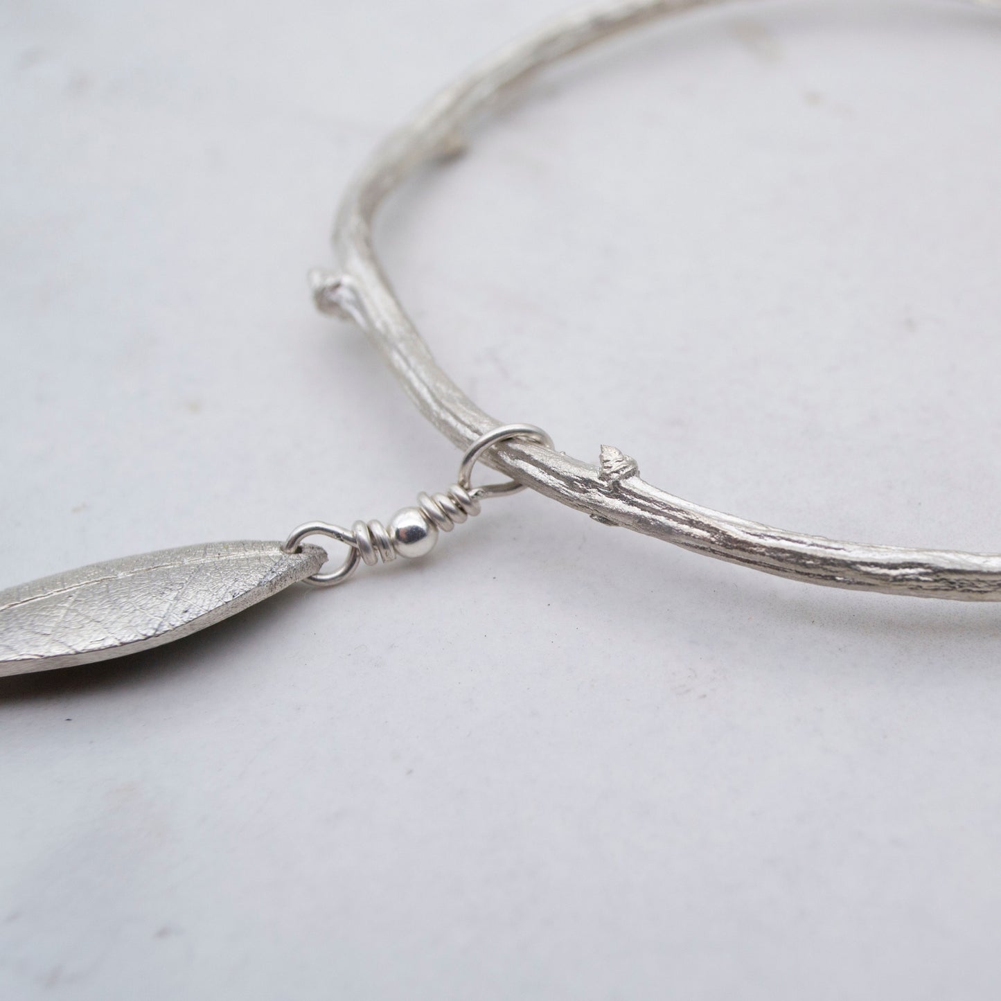 Apple twig sterling silver cuff bangle with sterling silver leaf