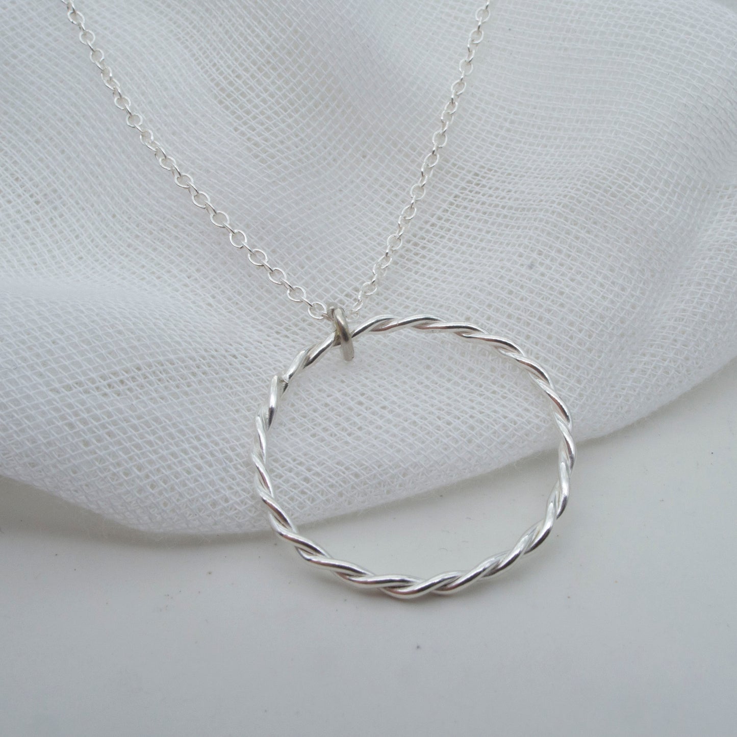 Circle twist pendant in sterling silver