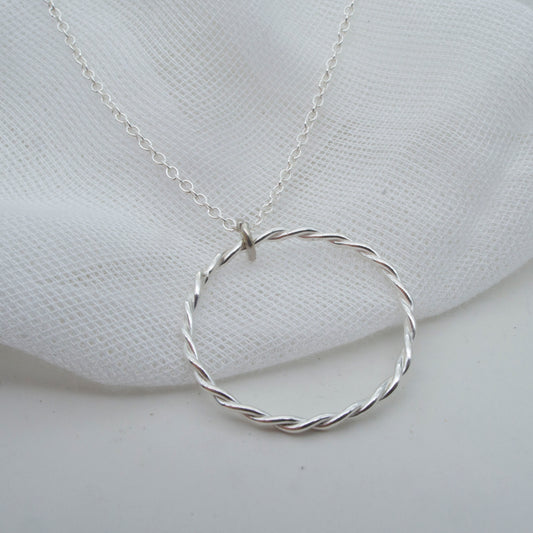 Circle twist pendant in sterling silver