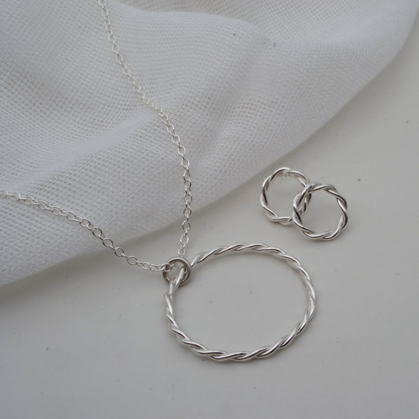 Circle twist pendant in sterling silver