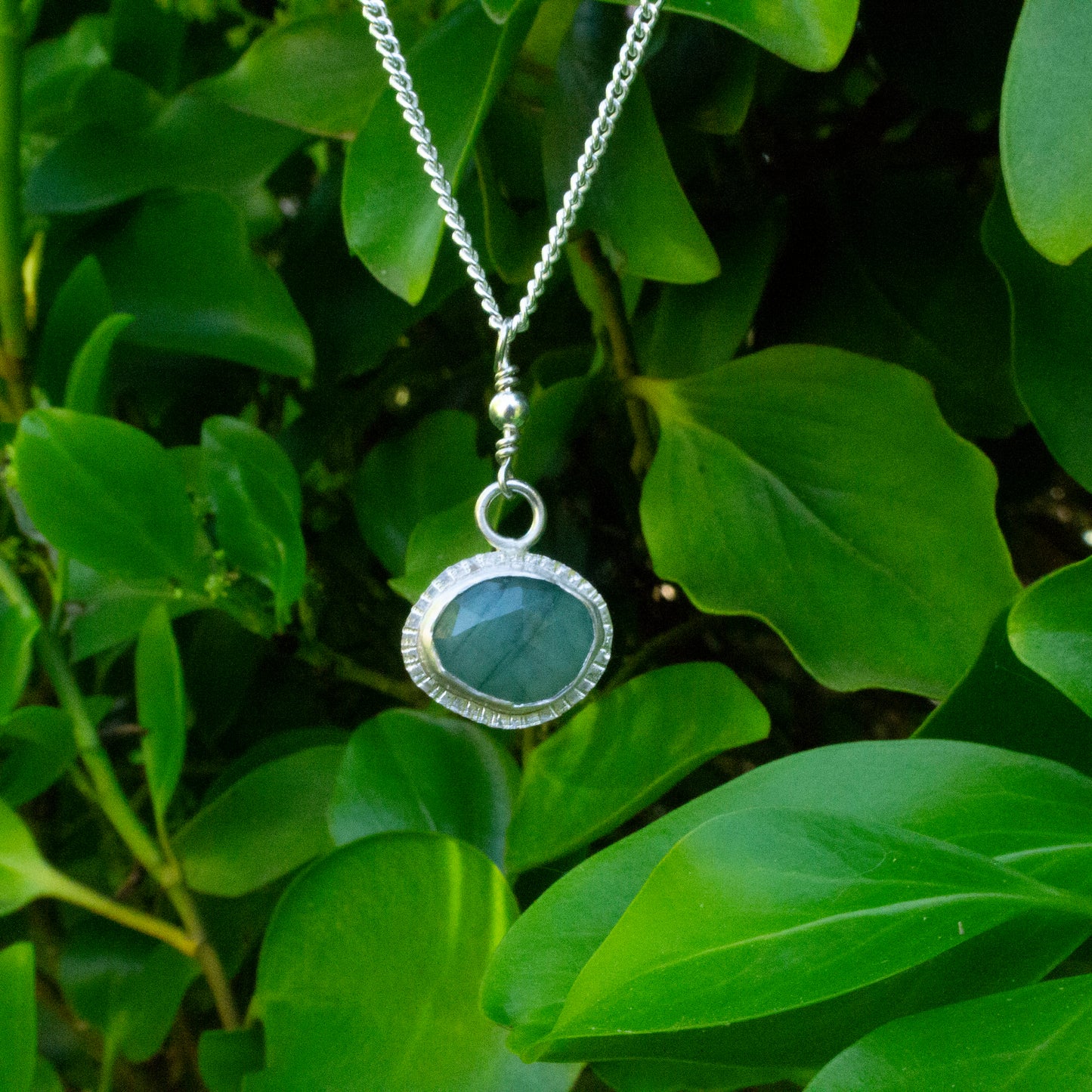 Framed emerald pendant necklace