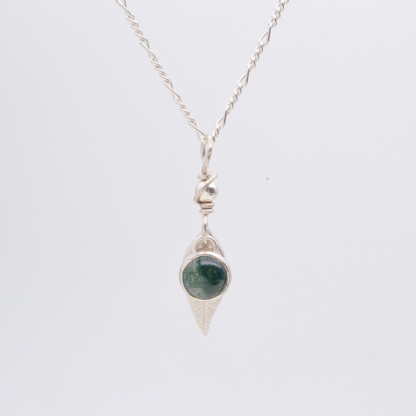 Moss agate pendant with silver leaf