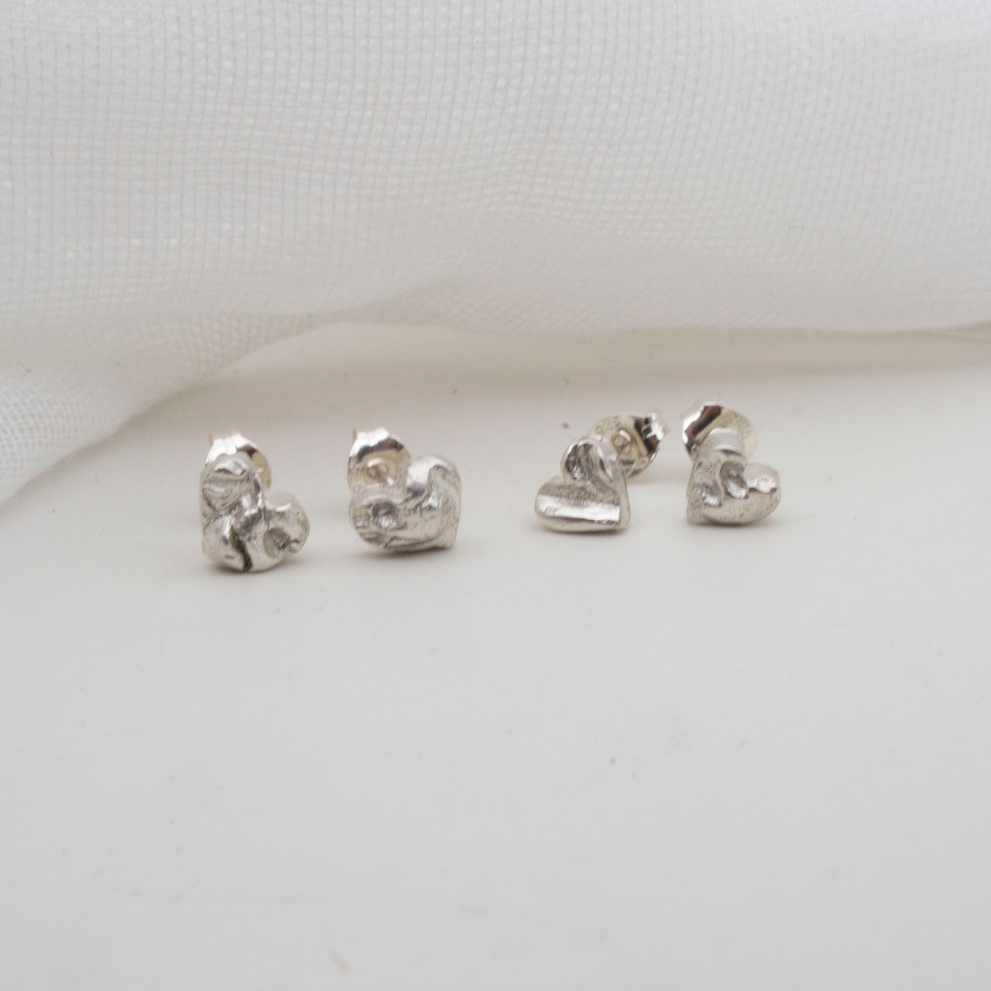 Textured heart stud earrings
