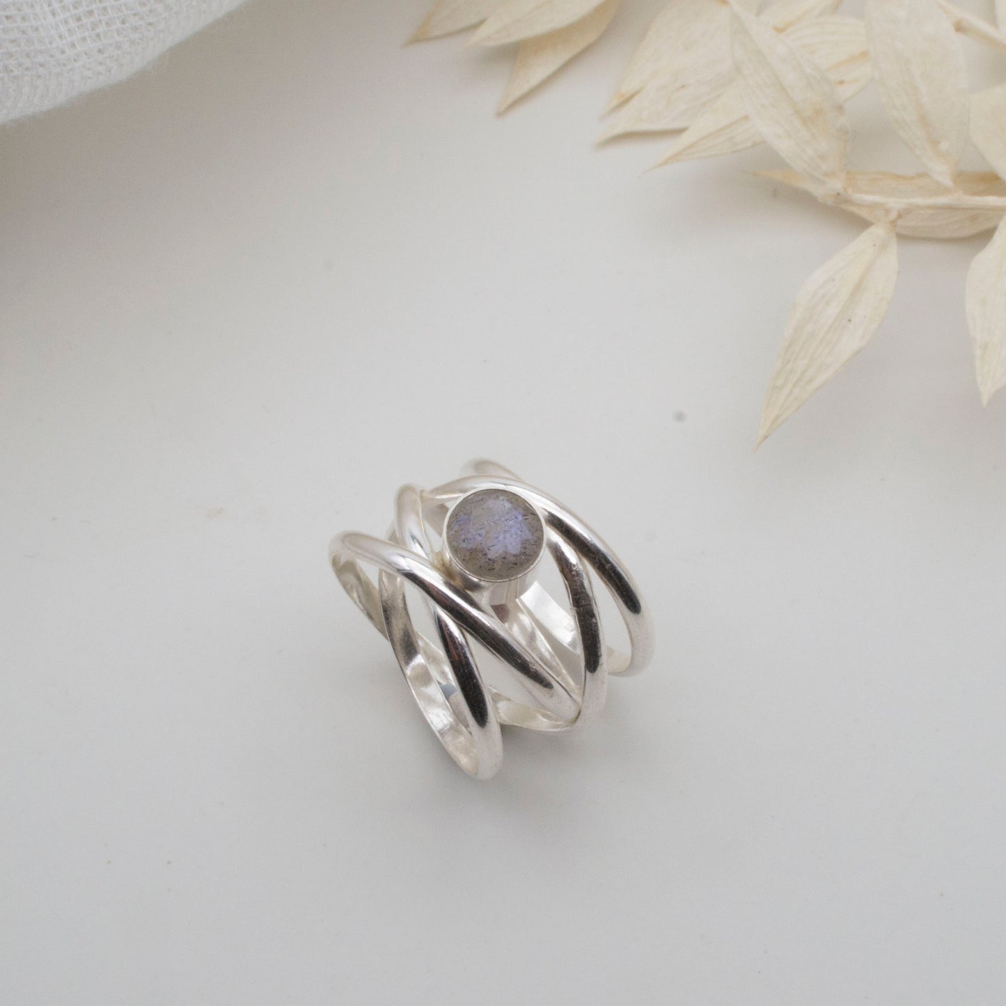 Spiralling gemstone ring