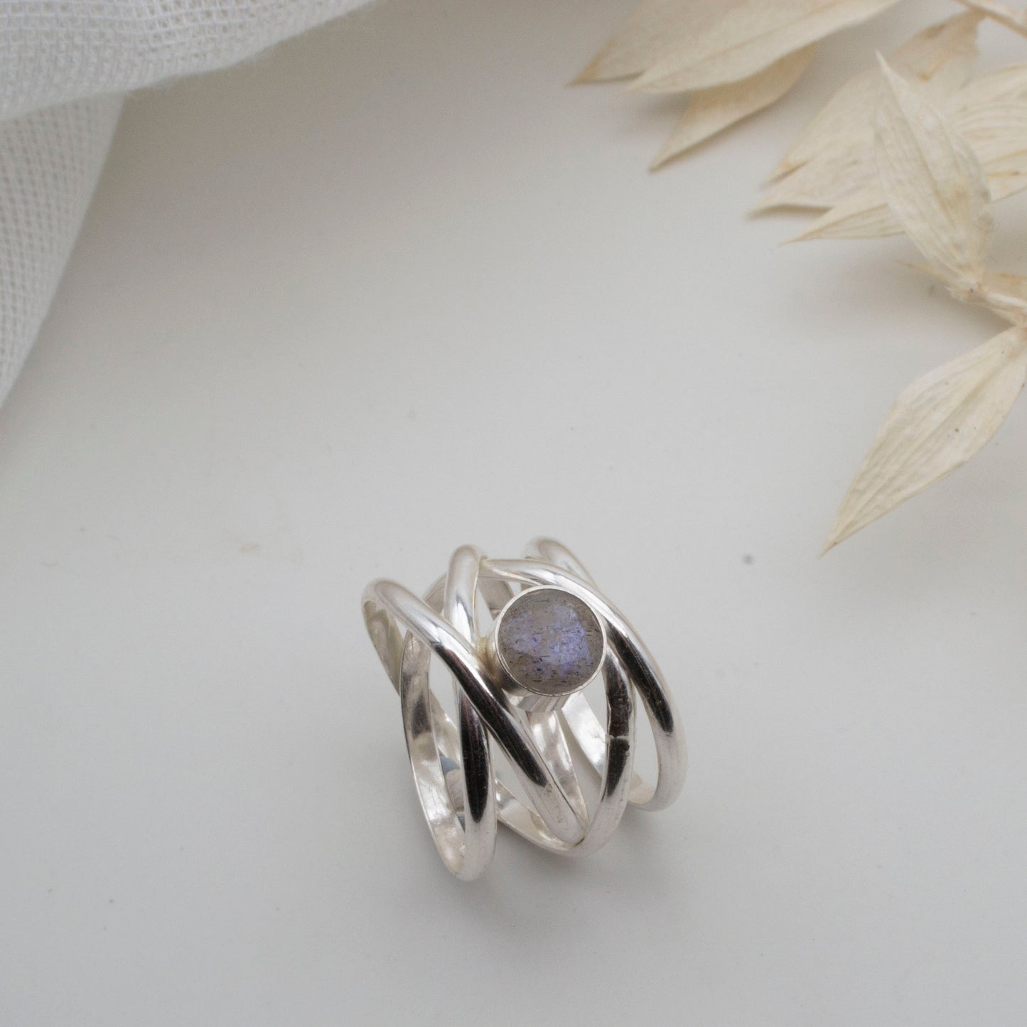Spiralling gemstone ring