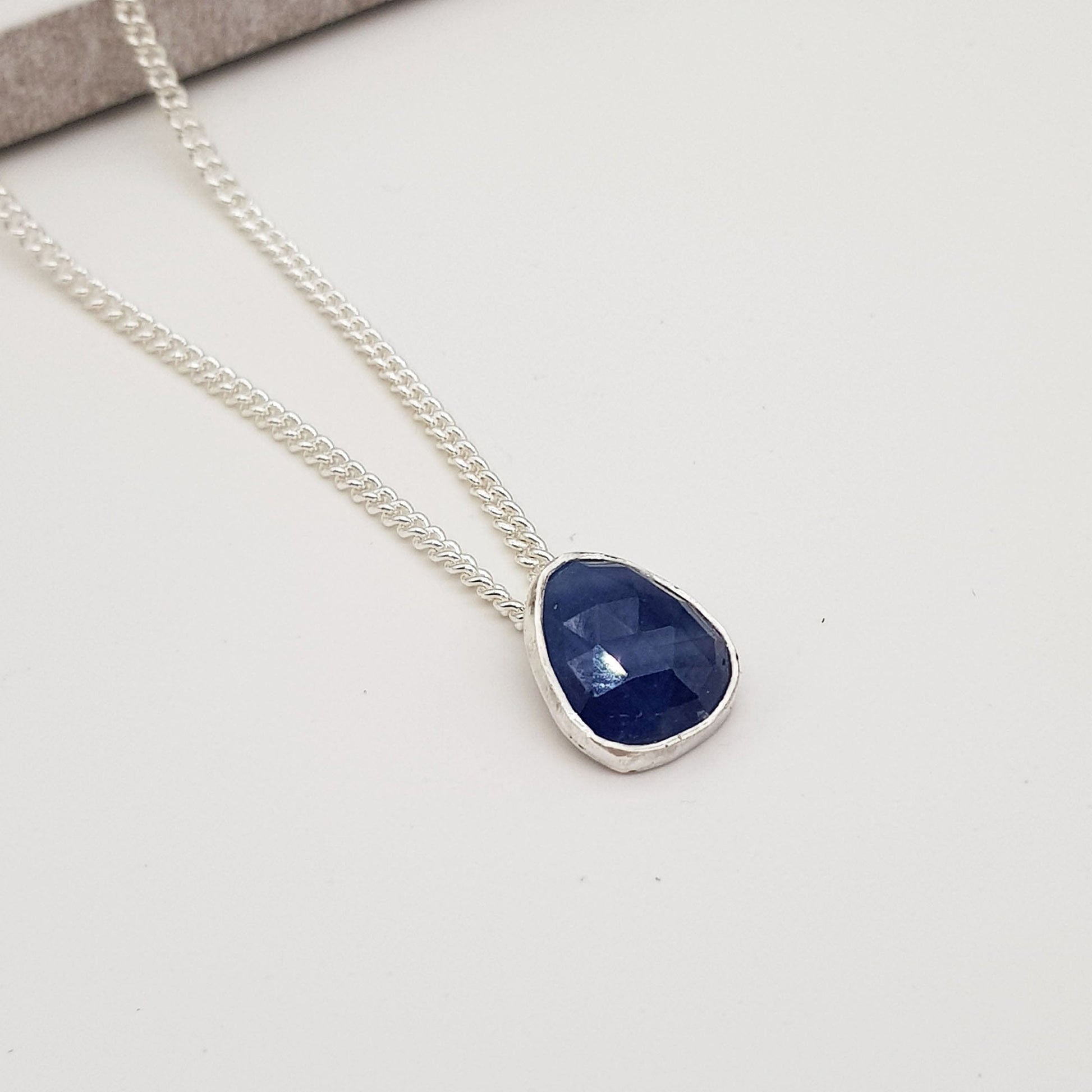 Becky Pearce Designs freeform blue sapphire pendant