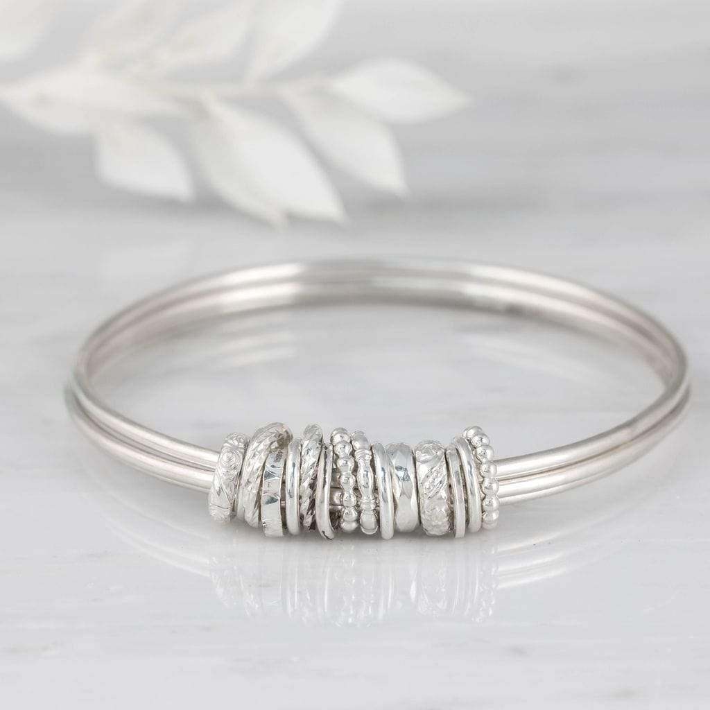 Becky Pearce Designs bangle Three linked bangles with ring charms