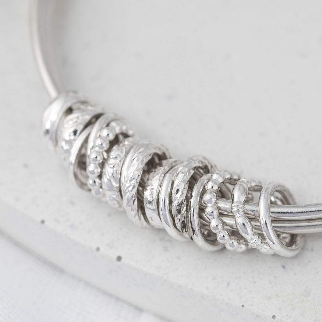 Becky Pearce Designs 3 bangles interlinked with ring charms